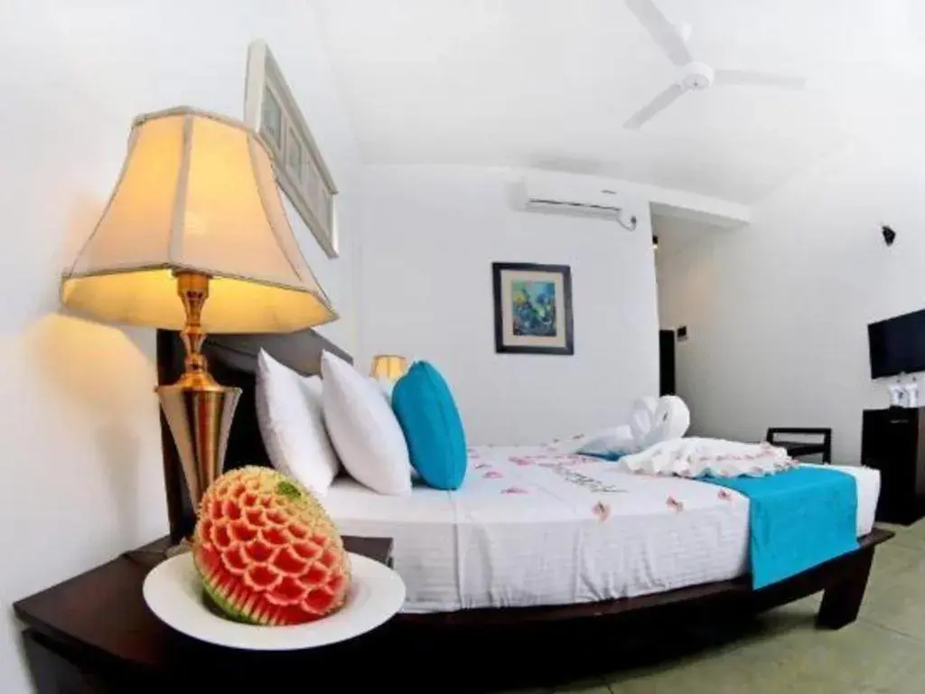 Bed in Coco Royal Beach Resort Bed in Coco Royal Beach Resort