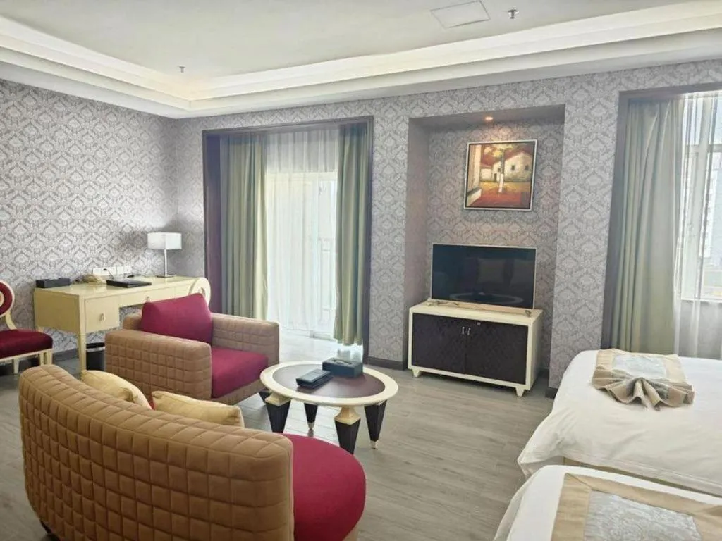 Bed in Hua Xia Pearl Hotel