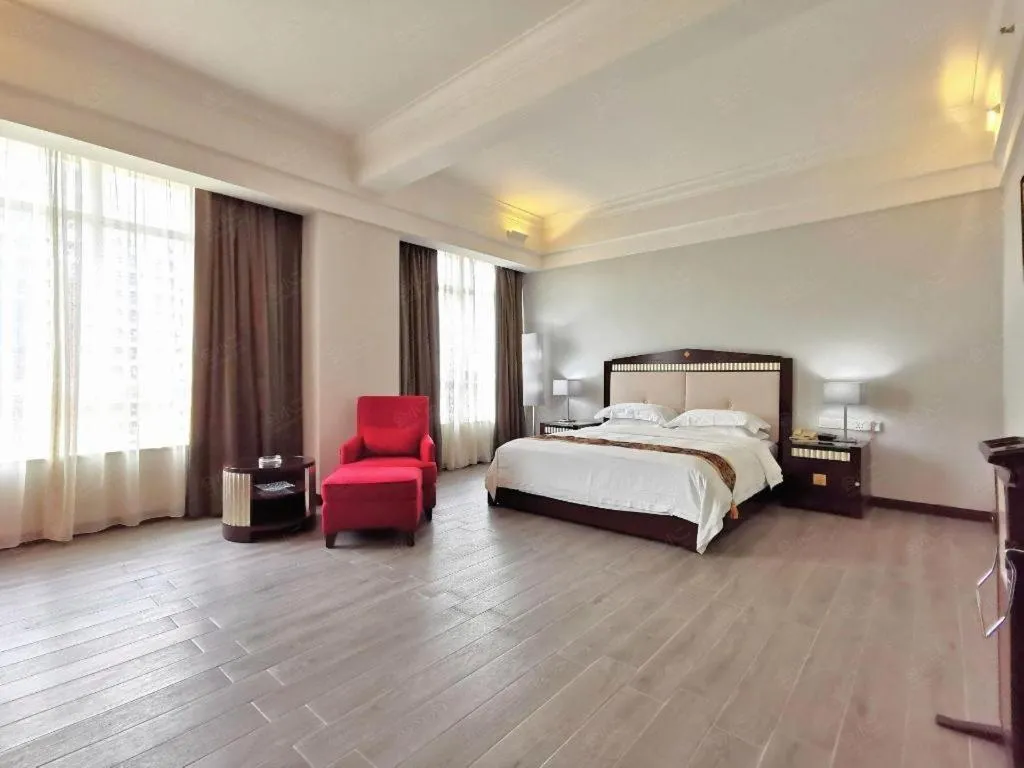 Bed in Hua Xia Pearl Hotel