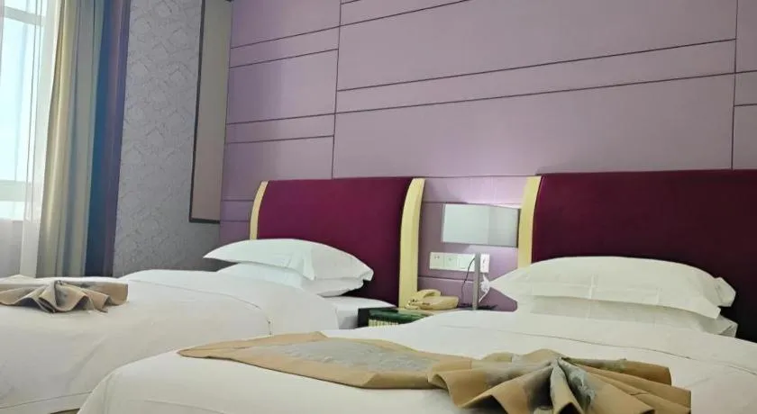 Bed in Hua Xia Pearl Hotel