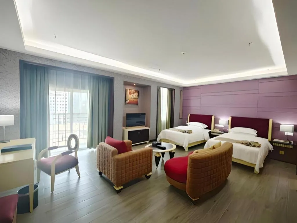 Bed in Hua Xia Pearl Hotel