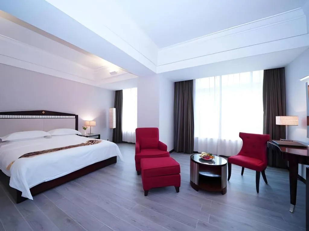 Bed in Hua Xia Pearl Hotel