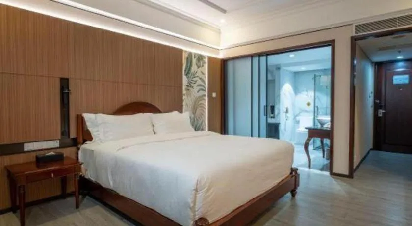 Bed in Hua Xia Pearl Hotel