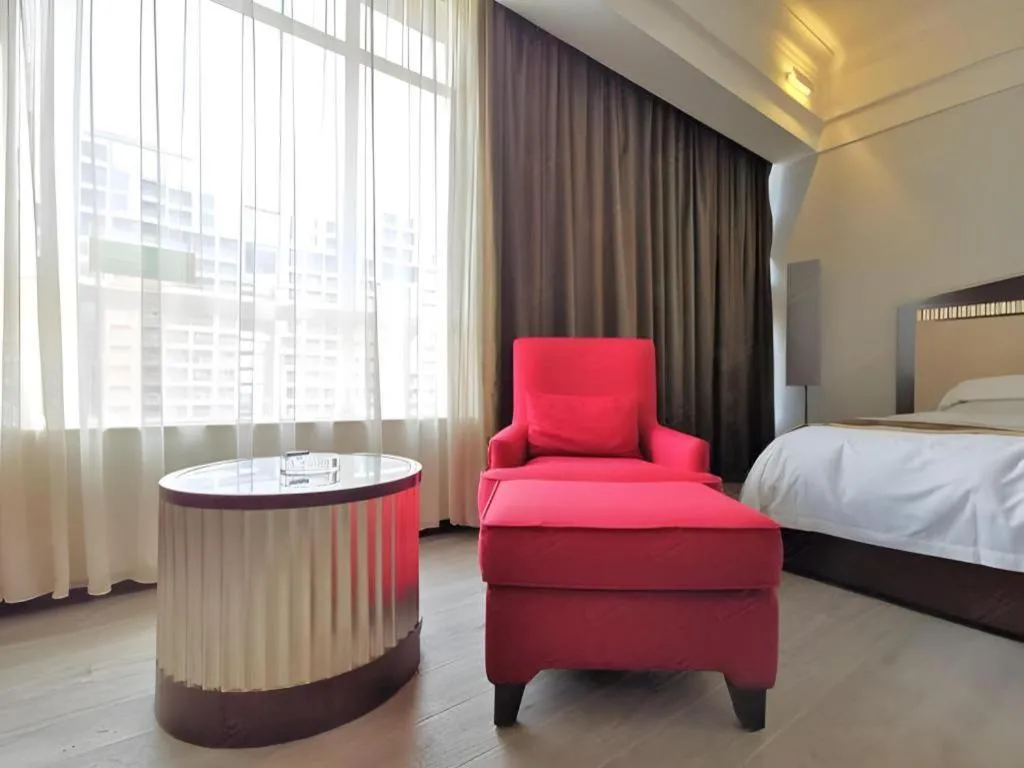 Bed in Hua Xia Pearl Hotel