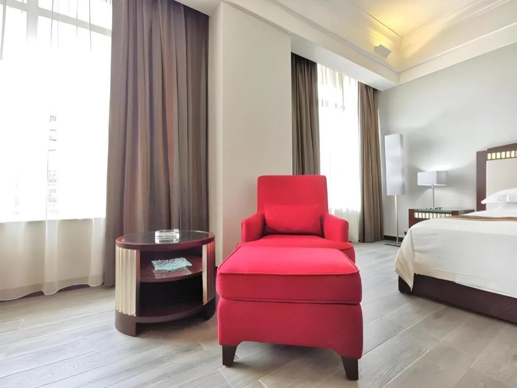 Bed in Hua Xia Pearl Hotel