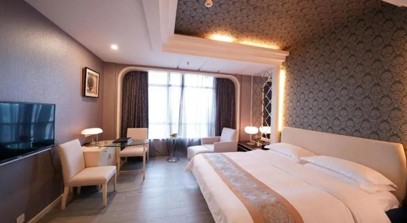 Bed in Hua Xia Pearl Hotel