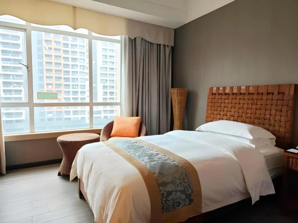 Bed in Hua Xia Pearl Hotel