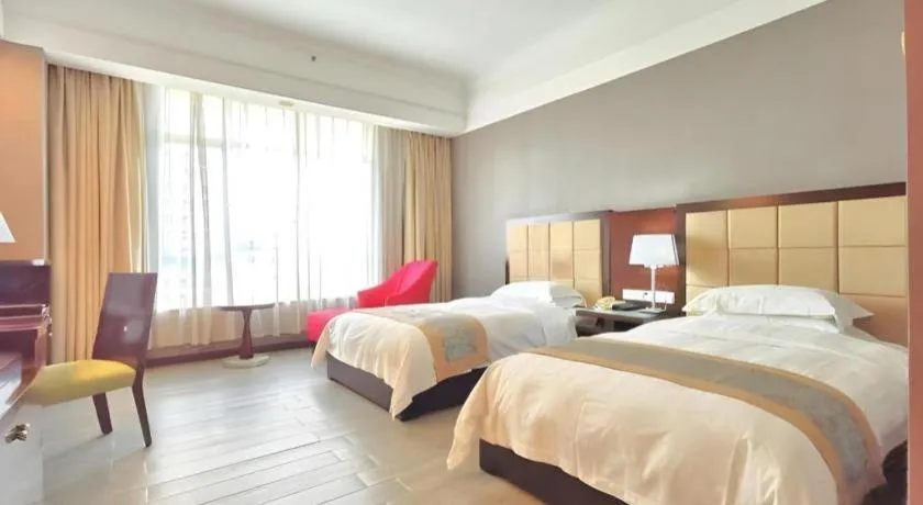 Bed in Hua Xia Pearl Hotel