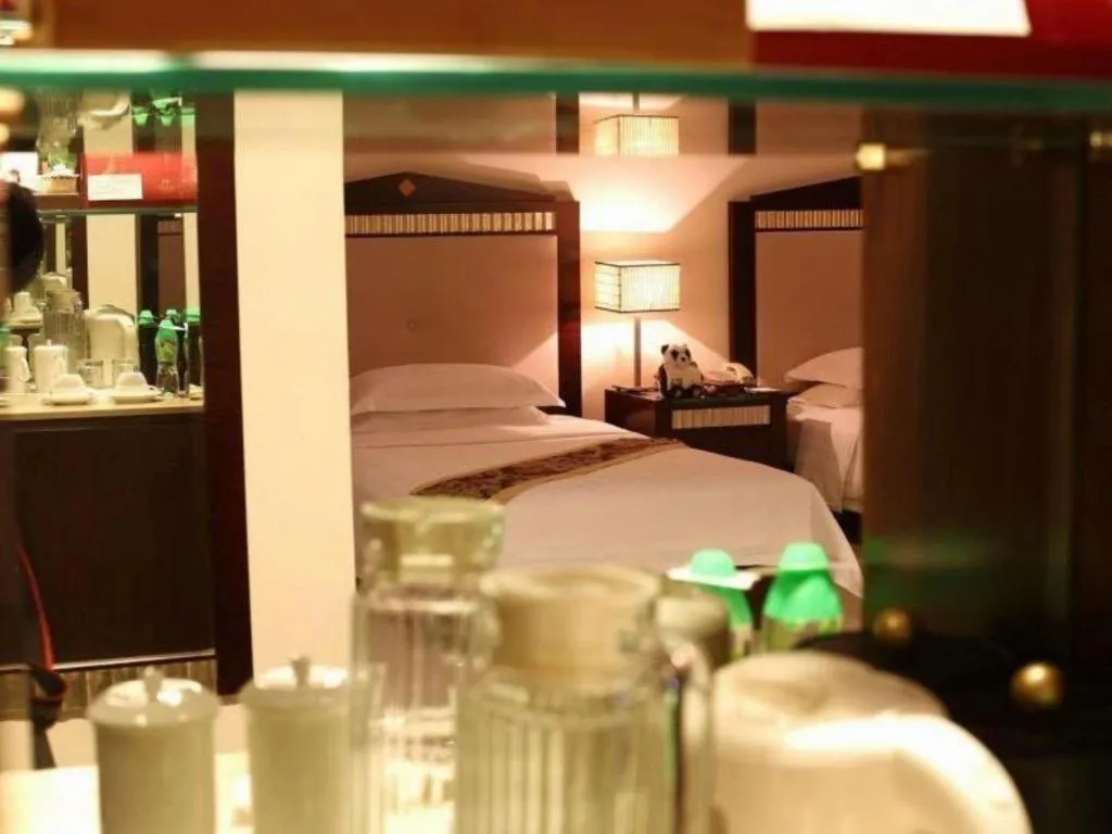 Bed in Hua Xia Pearl Hotel