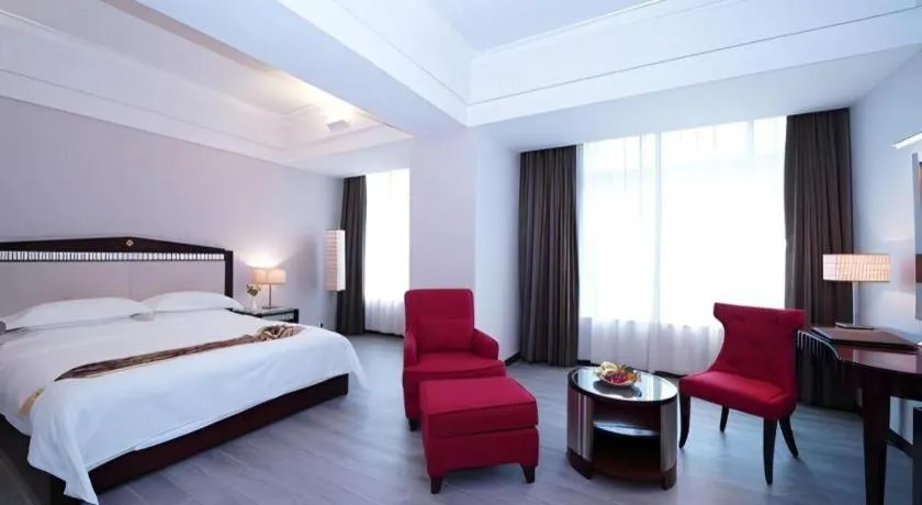 Bed in Hua Xia Pearl Hotel