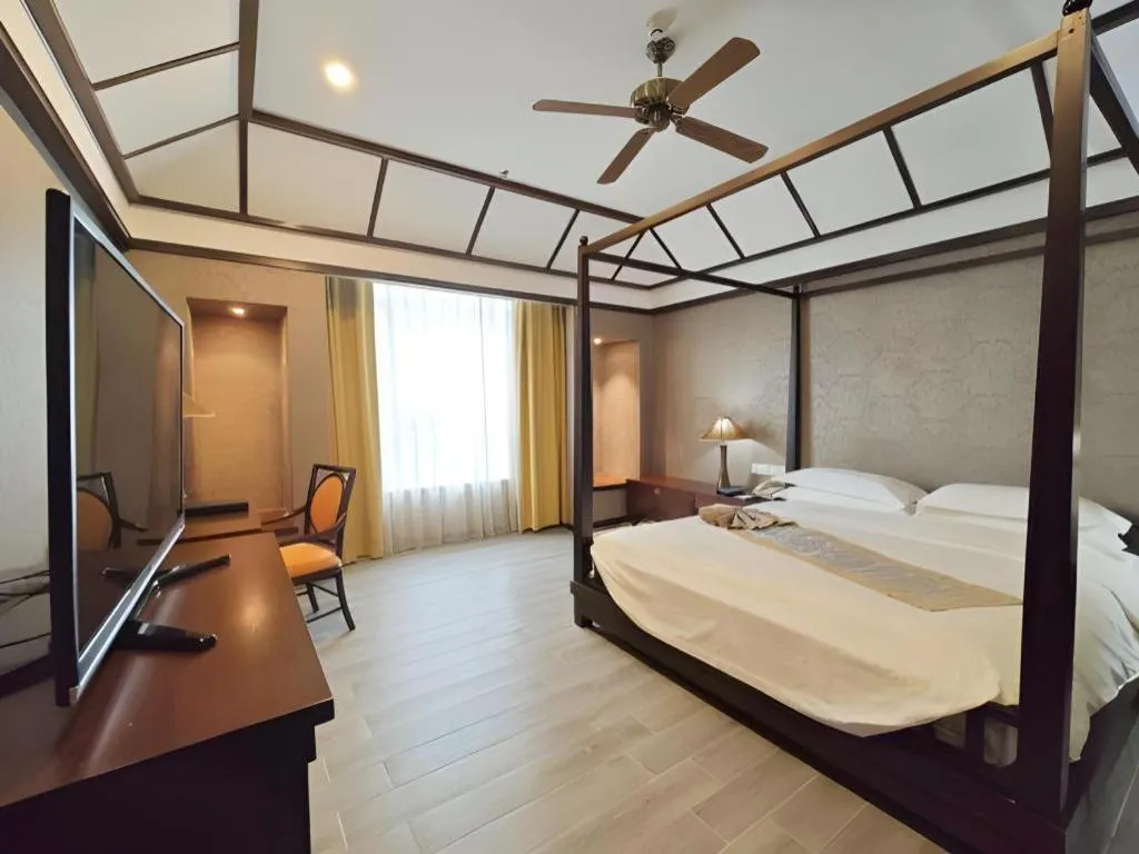 Bed in Hua Xia Pearl Hotel