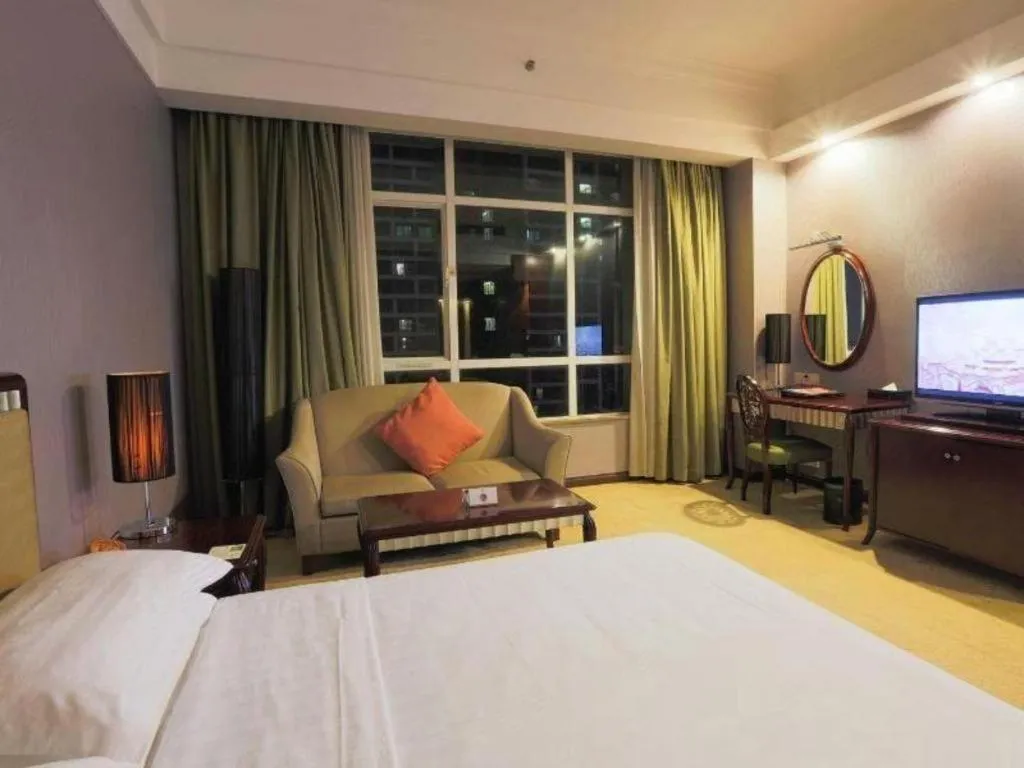 Bed in Hua Xia Pearl Hotel