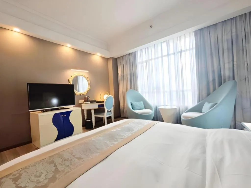 Bed in Hua Xia Pearl Hotel