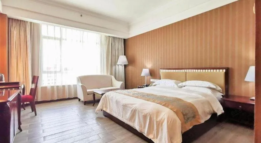 Bed in Hua Xia Pearl Hotel