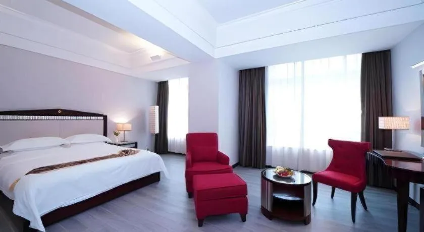 Bed in Hua Xia Pearl Hotel