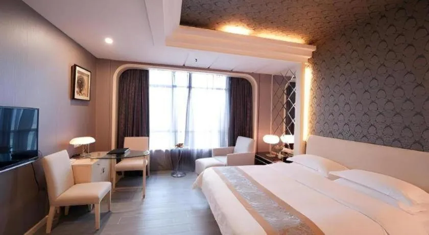 Bed in Hua Xia Pearl Hotel