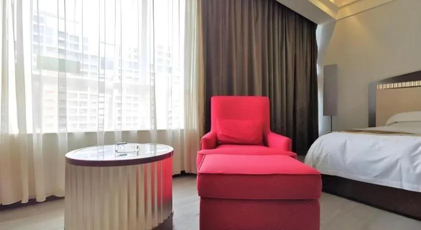 Bed in Hua Xia Pearl Hotel