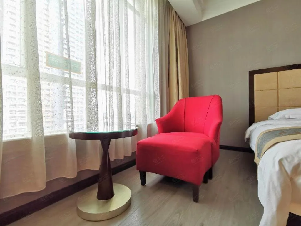 Bed in Hua Xia Pearl Hotel