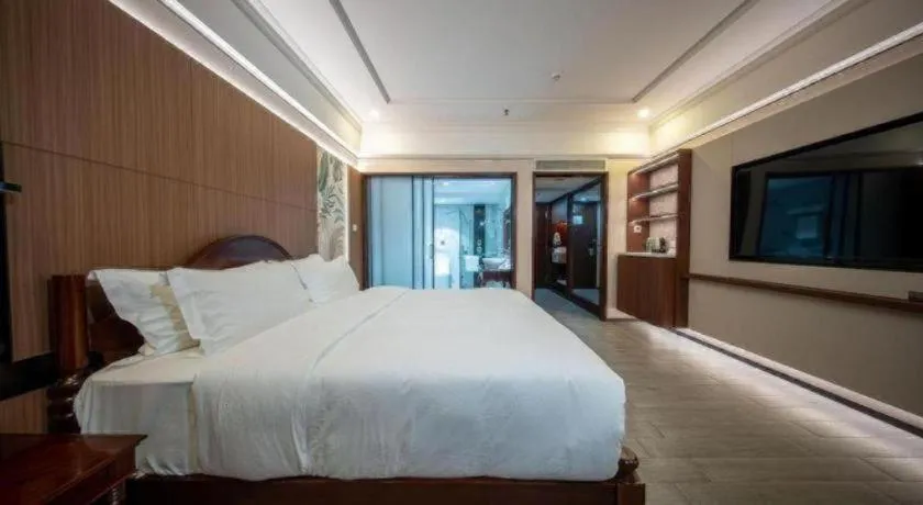 Bed in Hua Xia Pearl Hotel