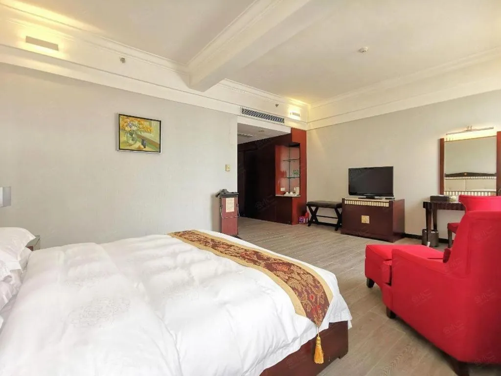 Bed in Hua Xia Pearl Hotel