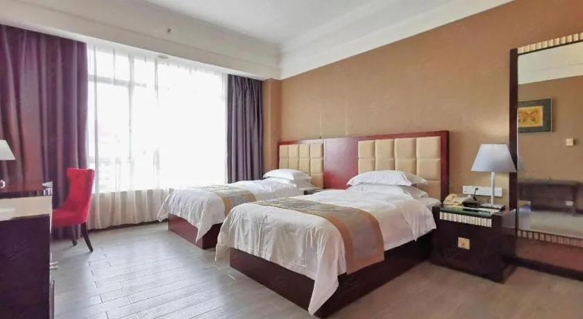 Bed in Hua Xia Pearl Hotel