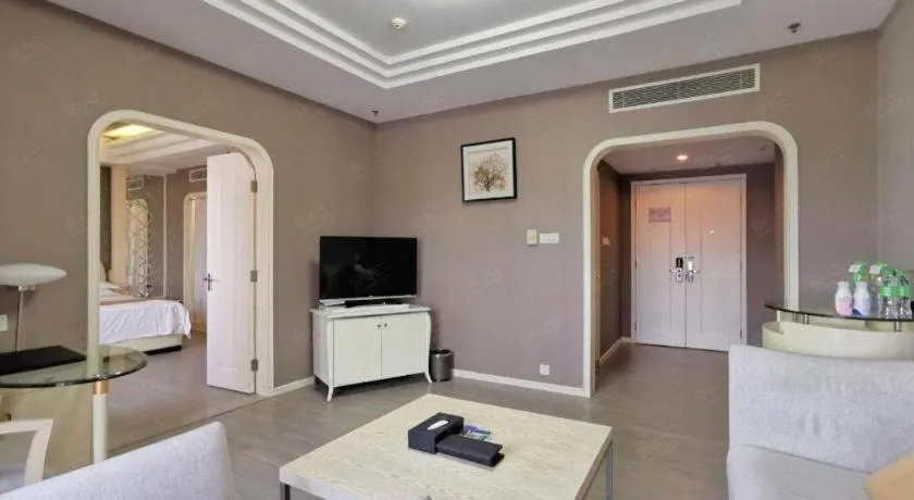 Bed in Hua Xia Pearl Hotel