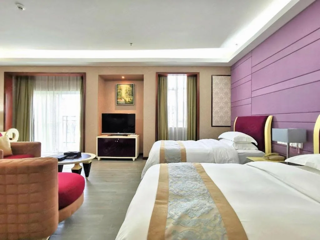 Bed in Hua Xia Pearl Hotel