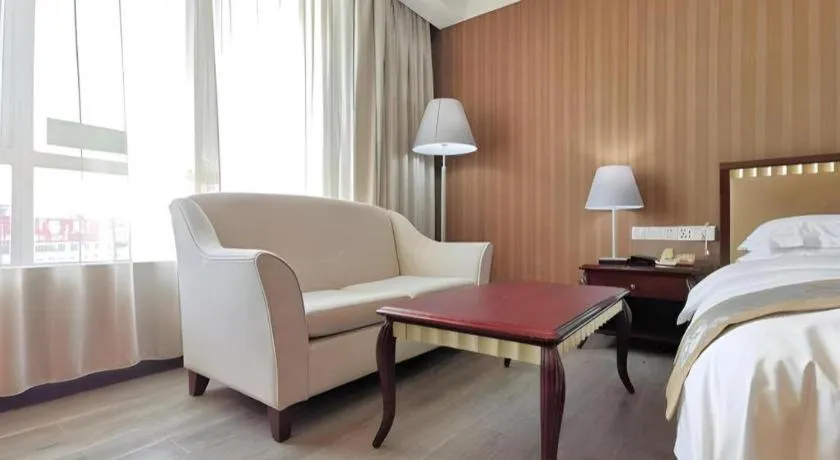 Bed in Hua Xia Pearl Hotel