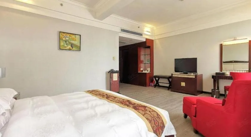 Bed in Hua Xia Pearl Hotel