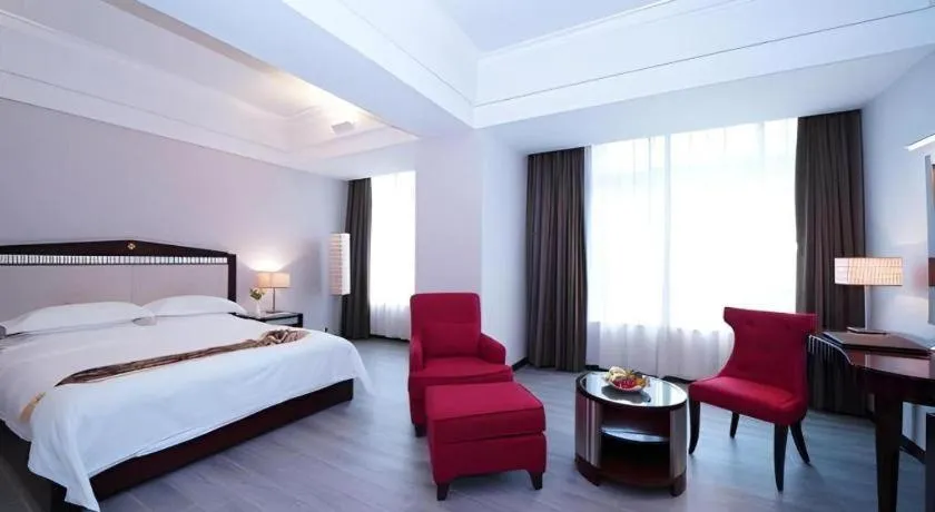 Bed in Hua Xia Pearl Hotel