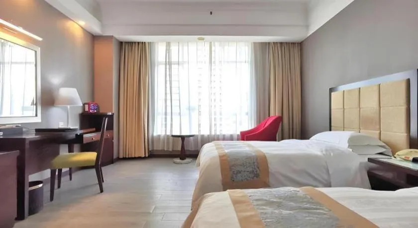 Bed in Hua Xia Pearl Hotel
