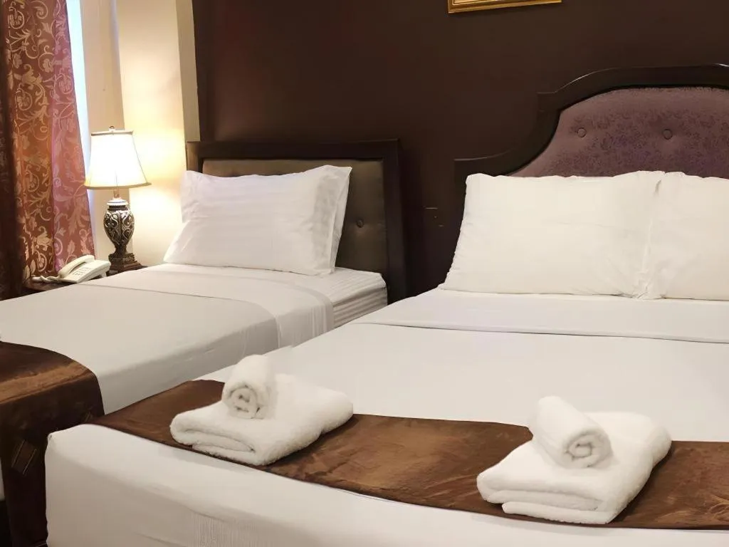 Bed in Peridot Suites