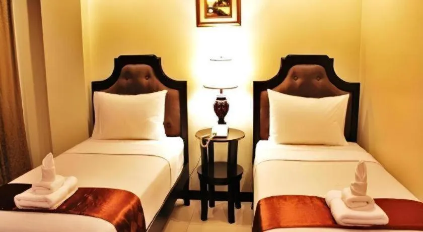 Bed in Peridot Suites