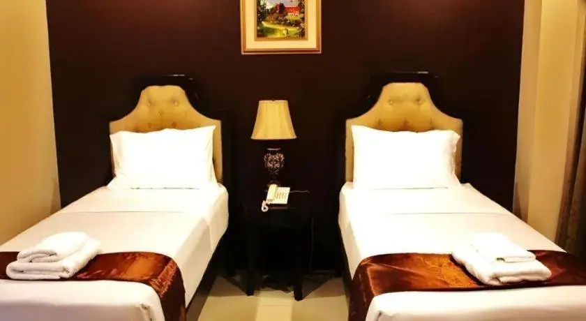 Bed in Peridot Suites Bed in Peridot Suites