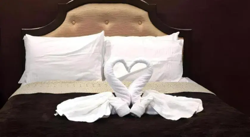 Bed in Peridot Suites Bed in Peridot Suites