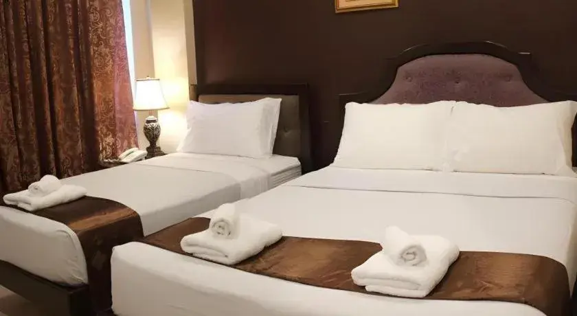 Bed in Peridot Suites Bed in Peridot Suites