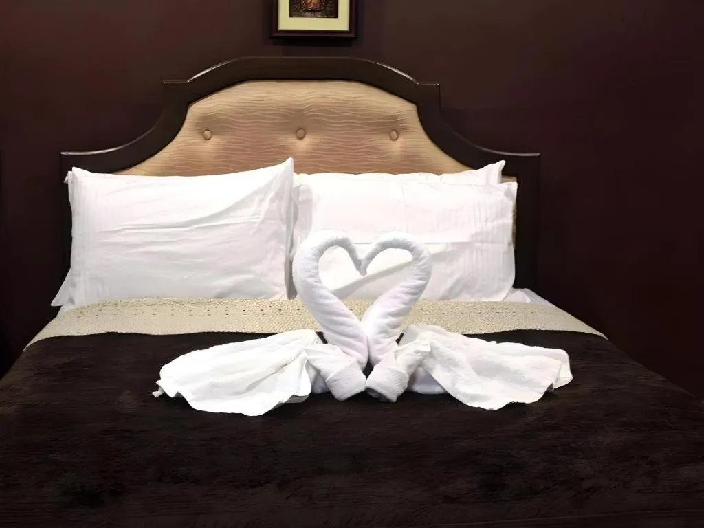 Bed in Peridot Suites