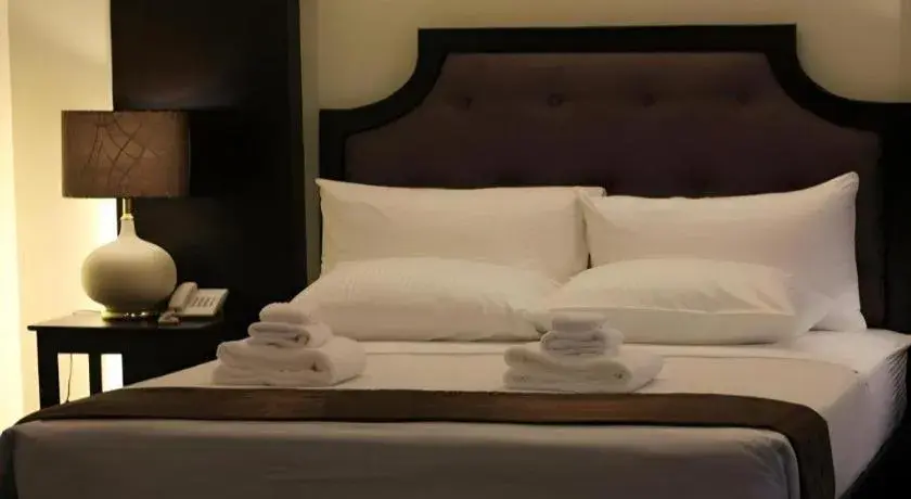 Bed in Peridot Suites Bed in Peridot Suites