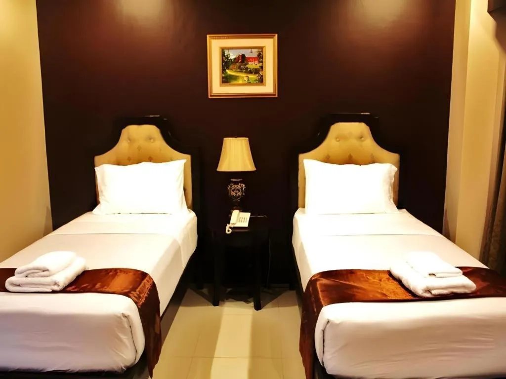 Bed in Peridot Suites