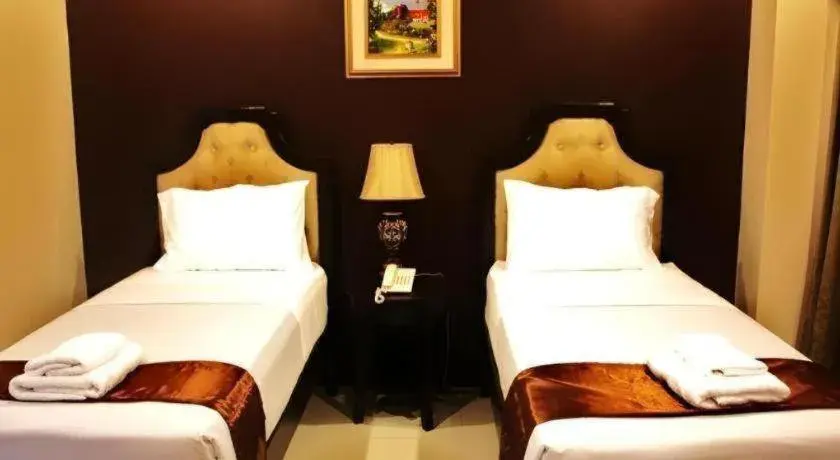 Bed in Peridot Suites Bed in Peridot Suites