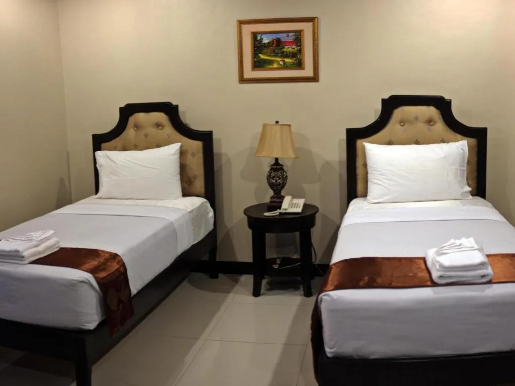 Bed in Peridot Suites