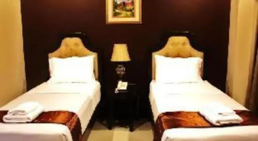 Bed in Peridot Suites Bed in Peridot Suites