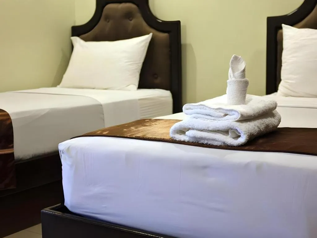 Bed in Peridot Suites