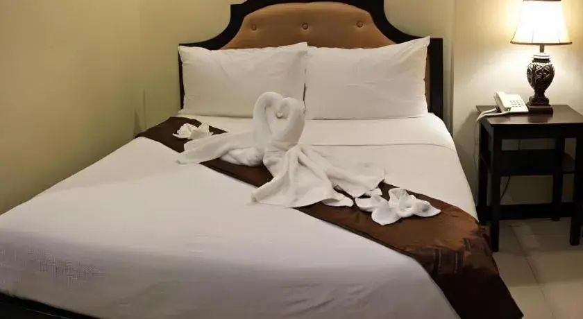Bed in Peridot Suites Bed in Peridot Suites