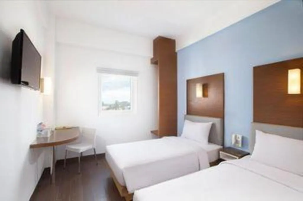 Bed in Amaris Hotel Kupang