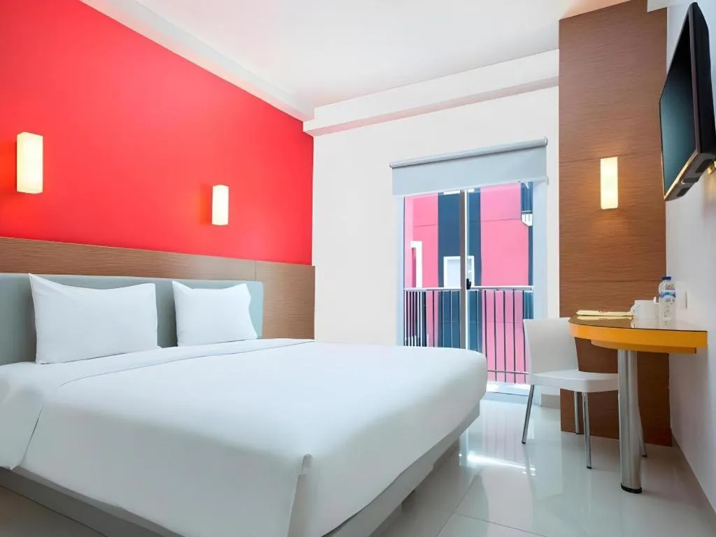 Bed in Amaris Hotel Kupang