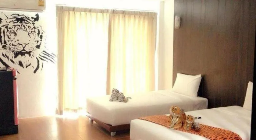 Bed in The Pride Hotel At Laemsing