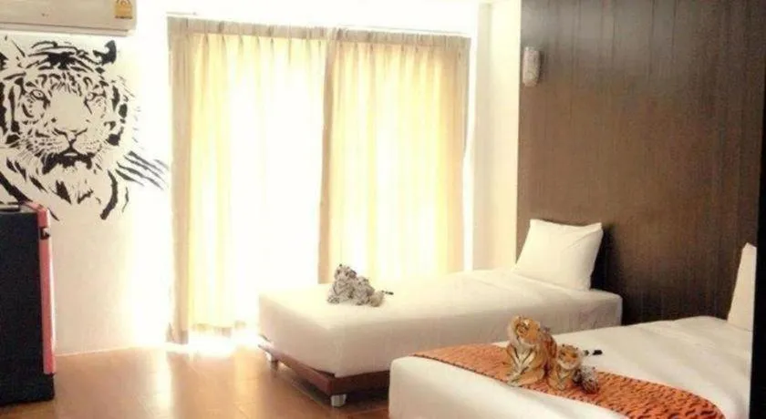 Bed in The Pride Hotel At Laemsing