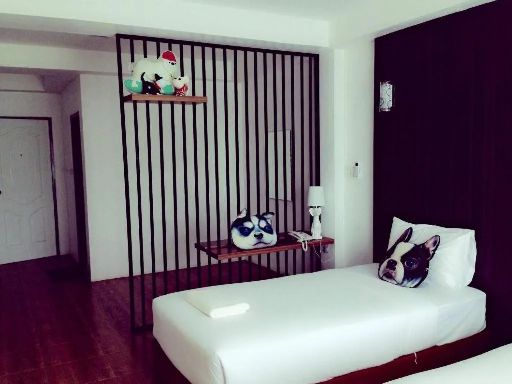 Bed in The Pride Hotel At Laemsing