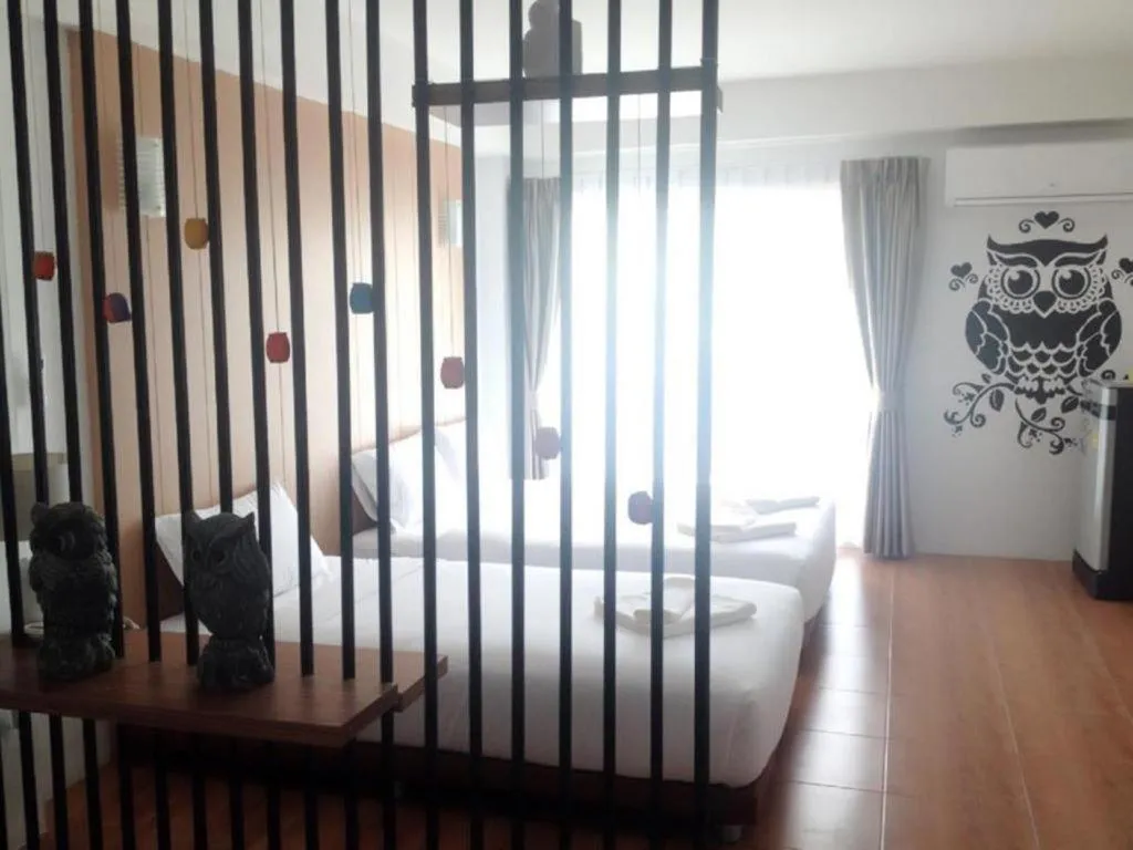 Bed in The Pride Hotel At Laemsing